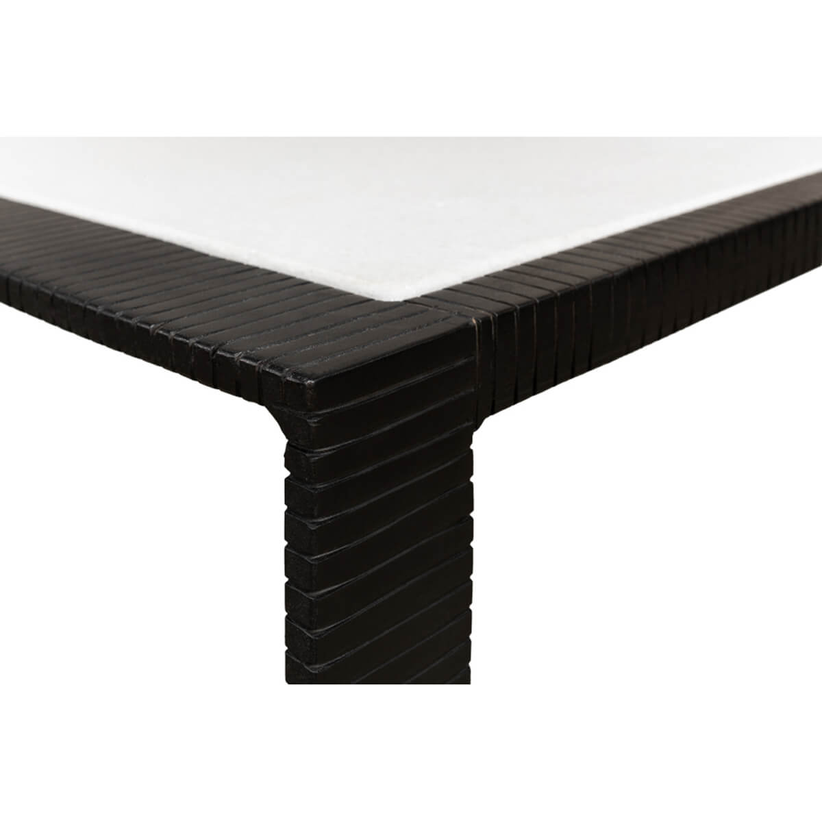 Close-up corner detail of modern marble top iron coffee table.