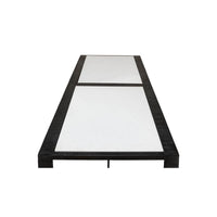 Top-down view of modern marble top iron coffee table surface.