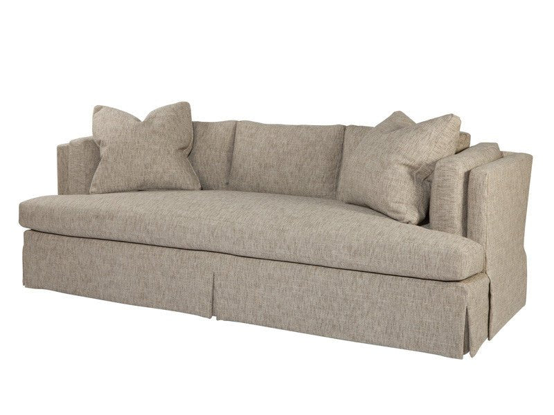 Beige sofa with pillows, side view, modern design