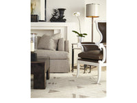 Beige sofa in room setting with modern decor