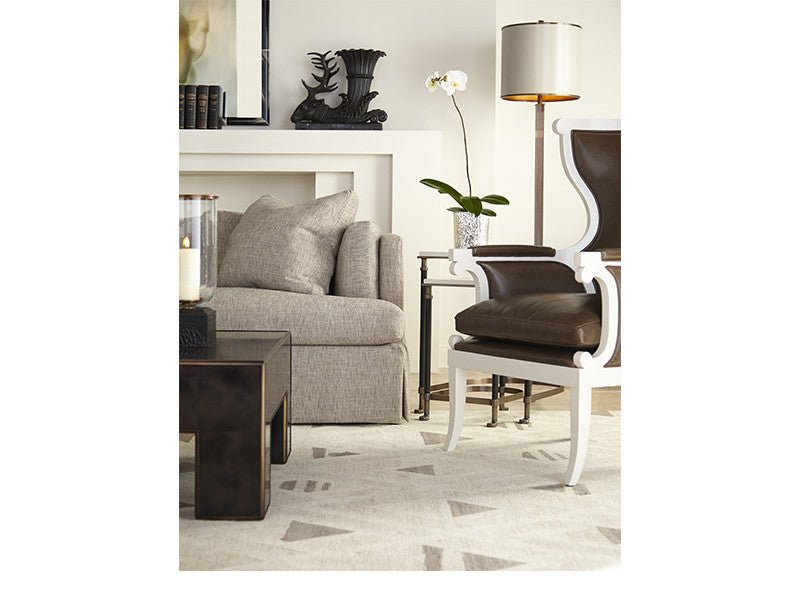 Beige sofa in room setting with modern decor