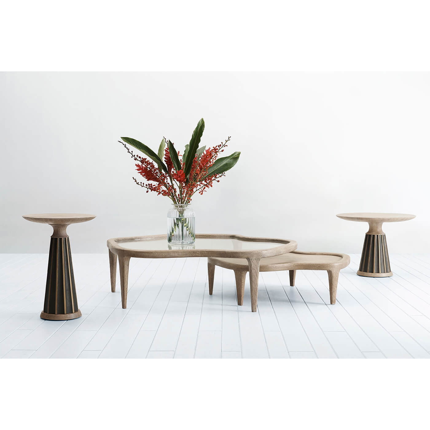 Nesting cocktail tables with decor, room setup, modern style.