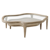 Nesting cocktail tables, top view, glass and wood surfaces.
