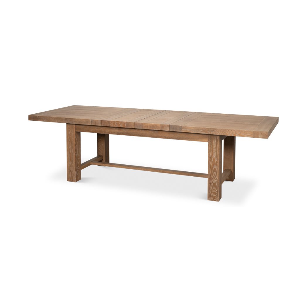 Oak extension dining table full view, angled left.