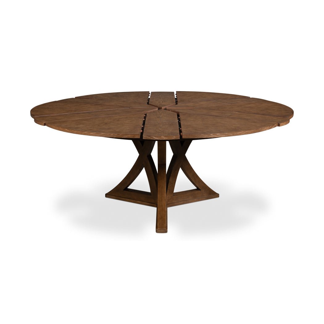 Oak table with partially extended leaves, wood finish.
