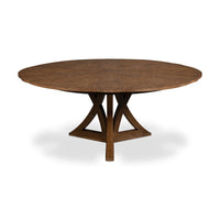 Extended oak dining table, round shape, wood finish.