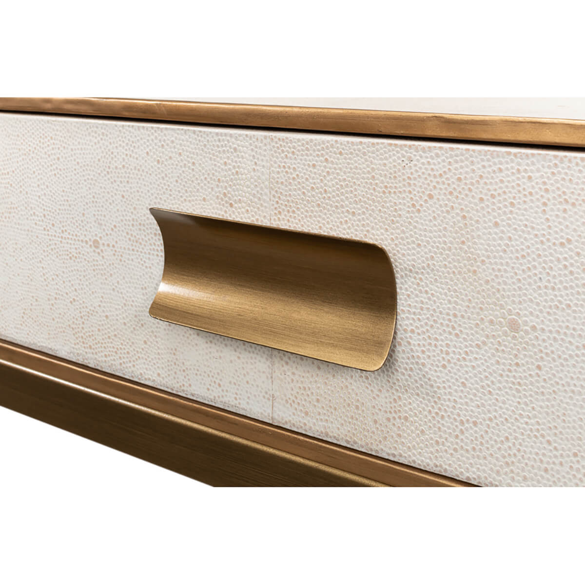Close-up of drawer handle and textured surface.