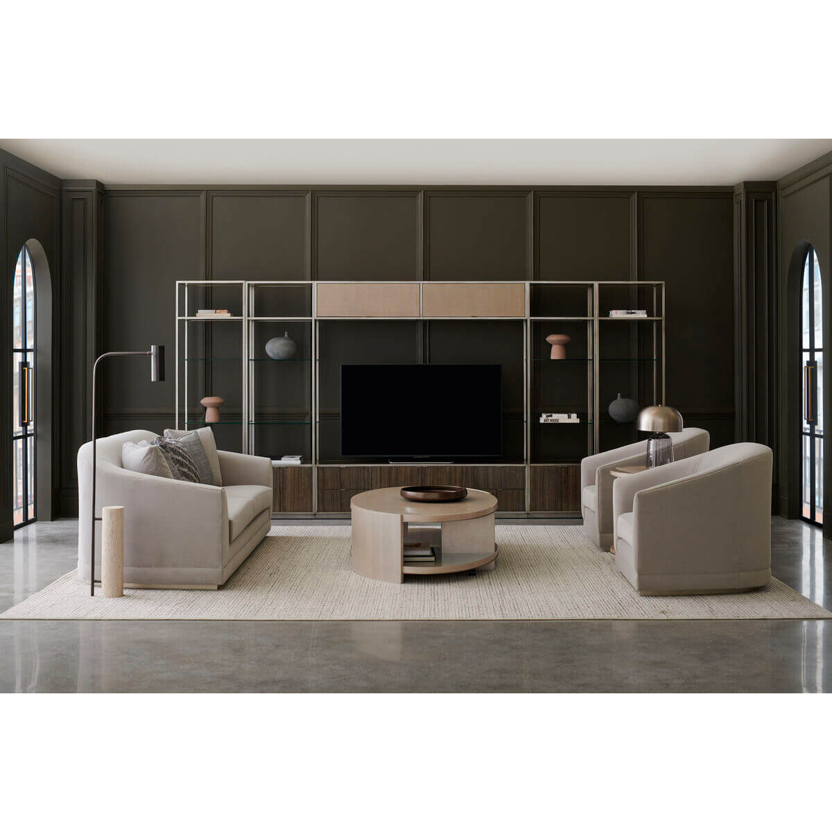 Modern living room featuring oval cocktail table setup.