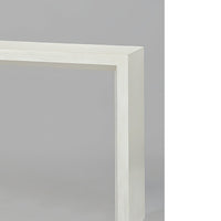 Close-up of console table corner, detailed beveled edge.