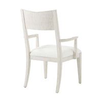 White dining armchair, back angle view.