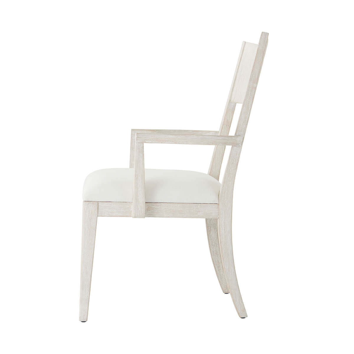 Side profile of white dining armchair.
