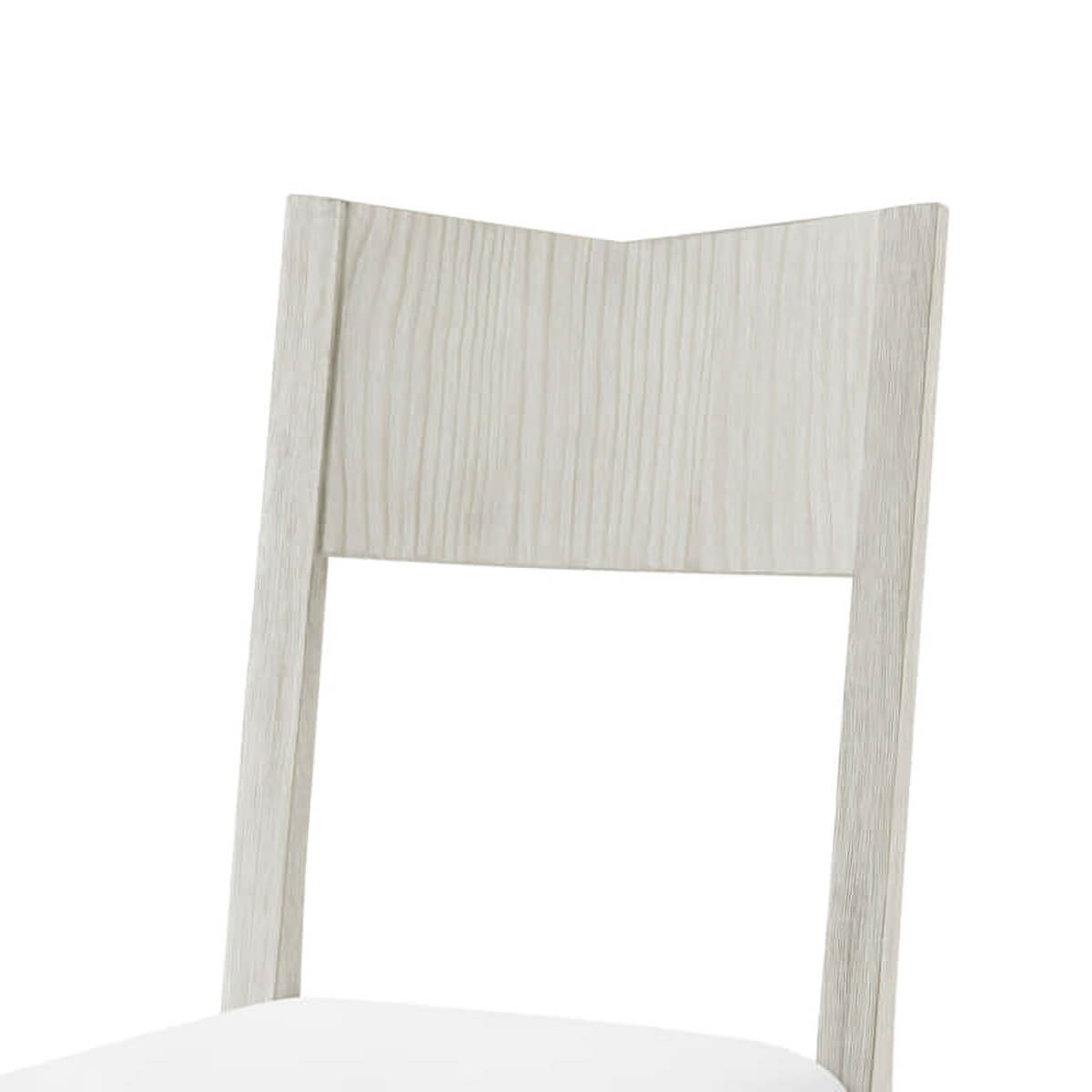Close-up of chair's wooden backrest design.