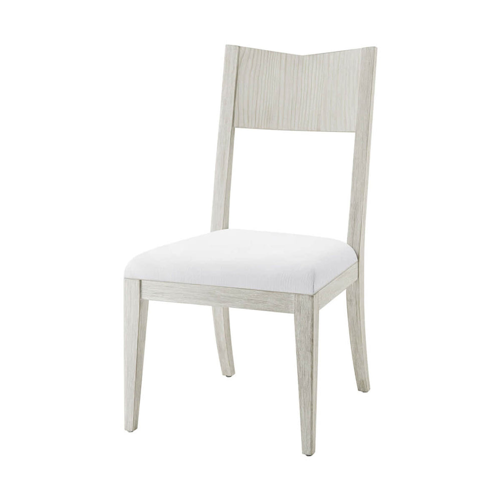 Modern painted dining chair with wooden back view.
