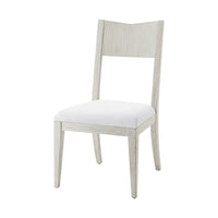 Modern painted dining chair with wooden back view.