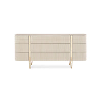 Front view of modern painted dresser with gold accents.