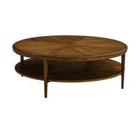 Side view of dark oak round coffee table with storage.