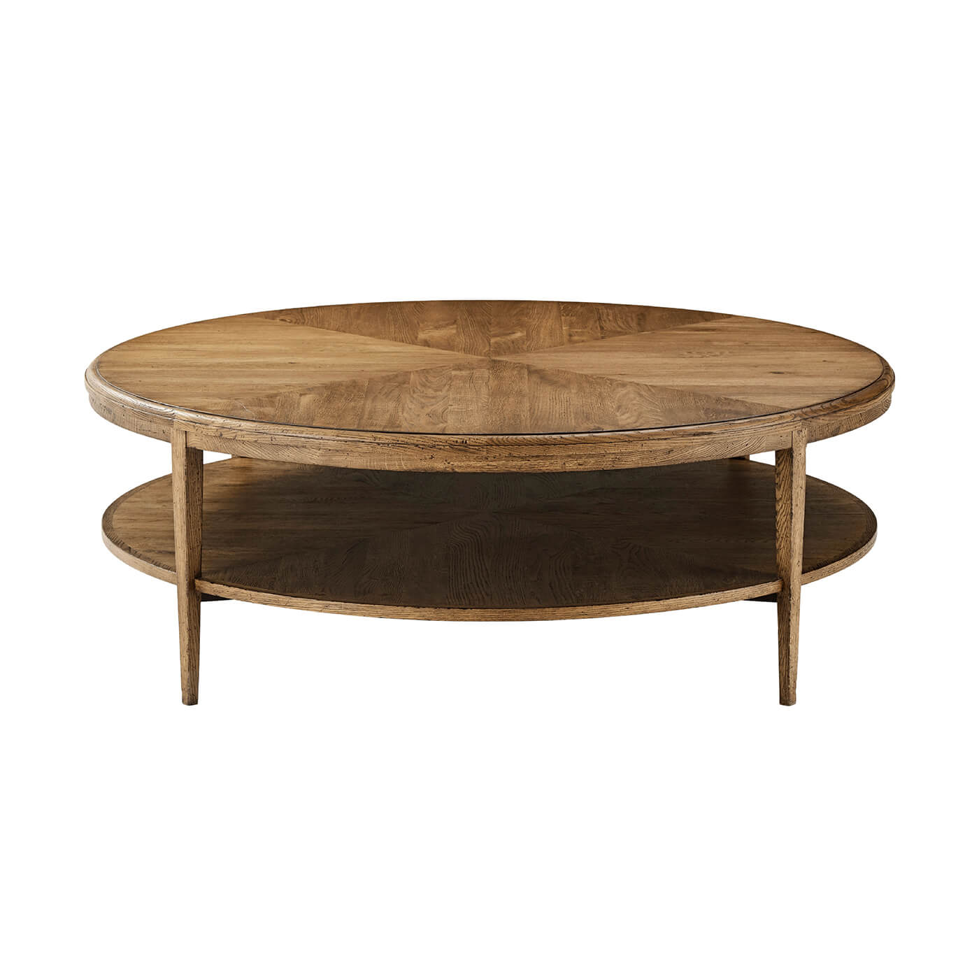 Front view of round coffee table, light oak.