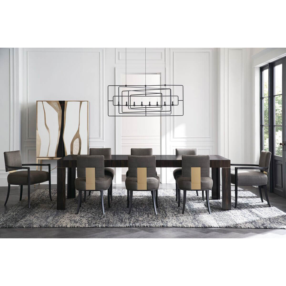 Dining table with chairs in elegant room setting.