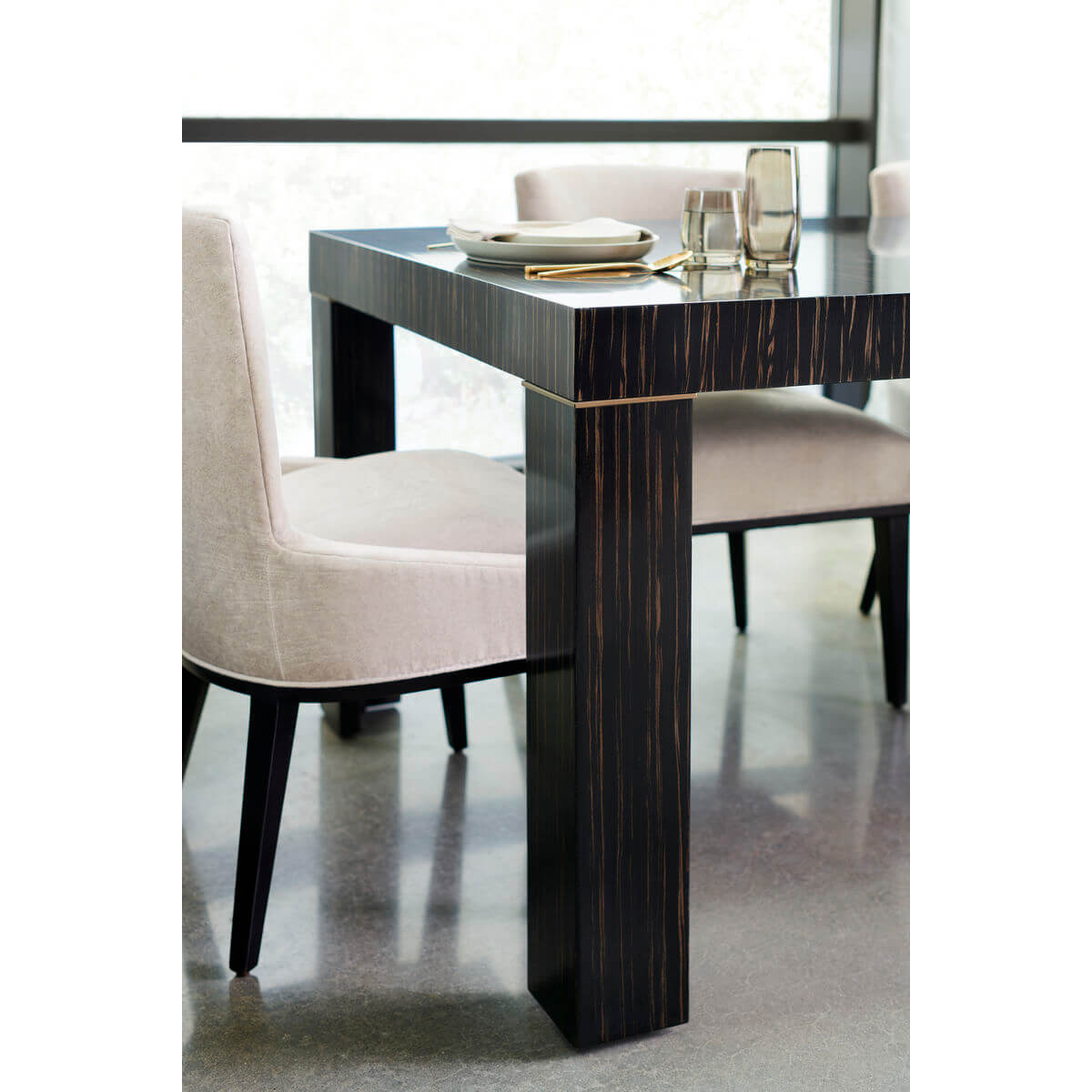 Table with chairs, close-up side view.