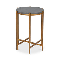 Angled view of accent table with gold legs.