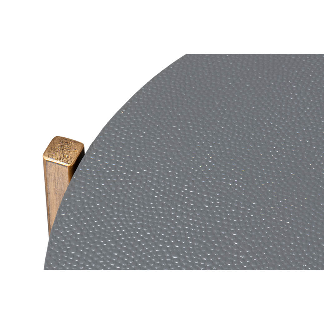 Textured leather surface on accent table top.