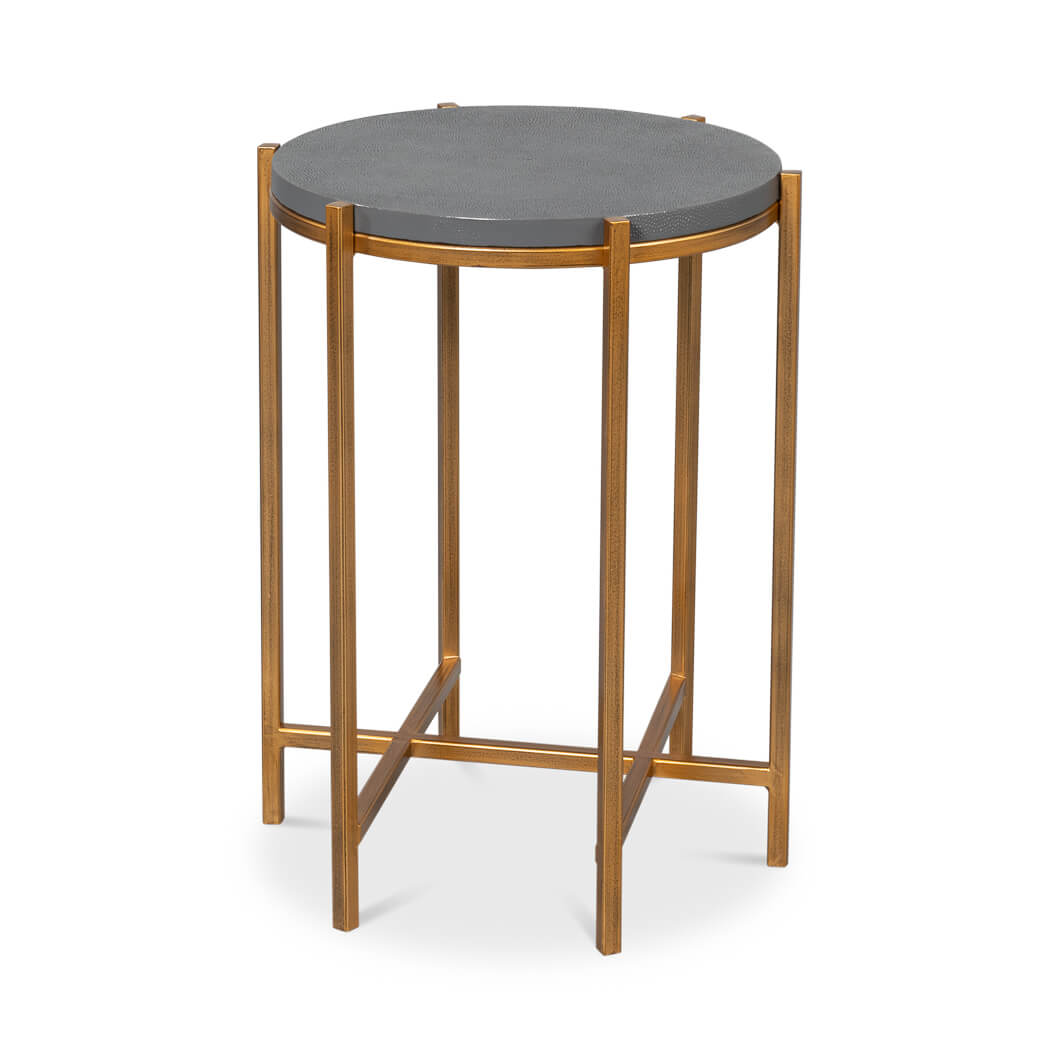 Round accent table with leather top side view.