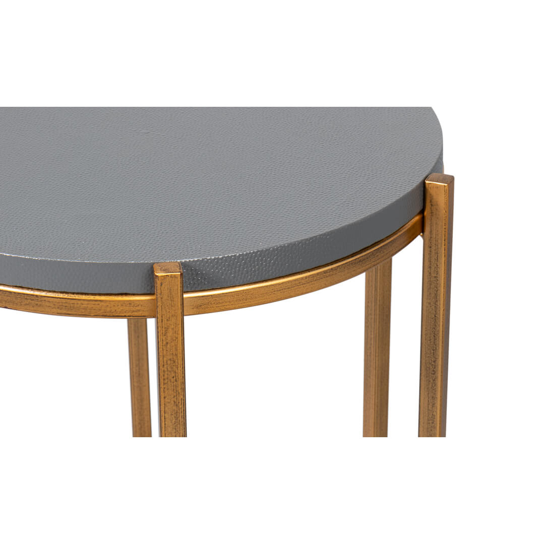 Close-up of accent table corner and surface texture.