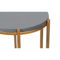 Close-up of accent table corner and surface texture.