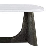 Detail of coffee table's sculpted charcoal leg and top.