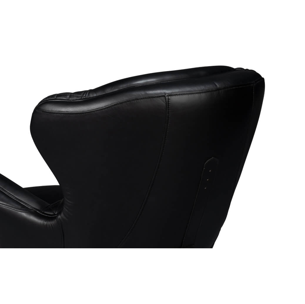 Buckle detail on black leather armchair side.