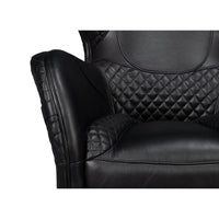 Close-up of armchair's backrest in black leather.