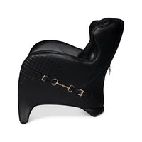 Back view of armchair with leather strap.