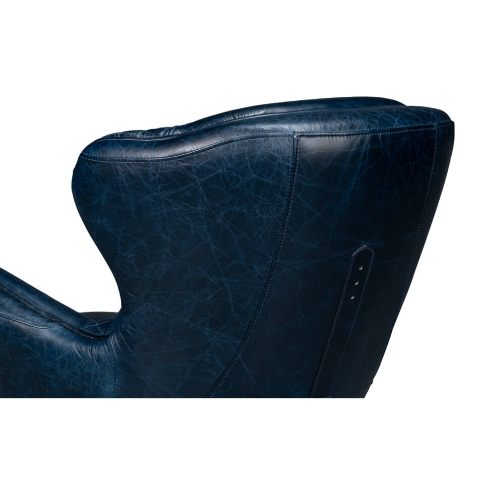 Blue leather armchair backrest corner detail.