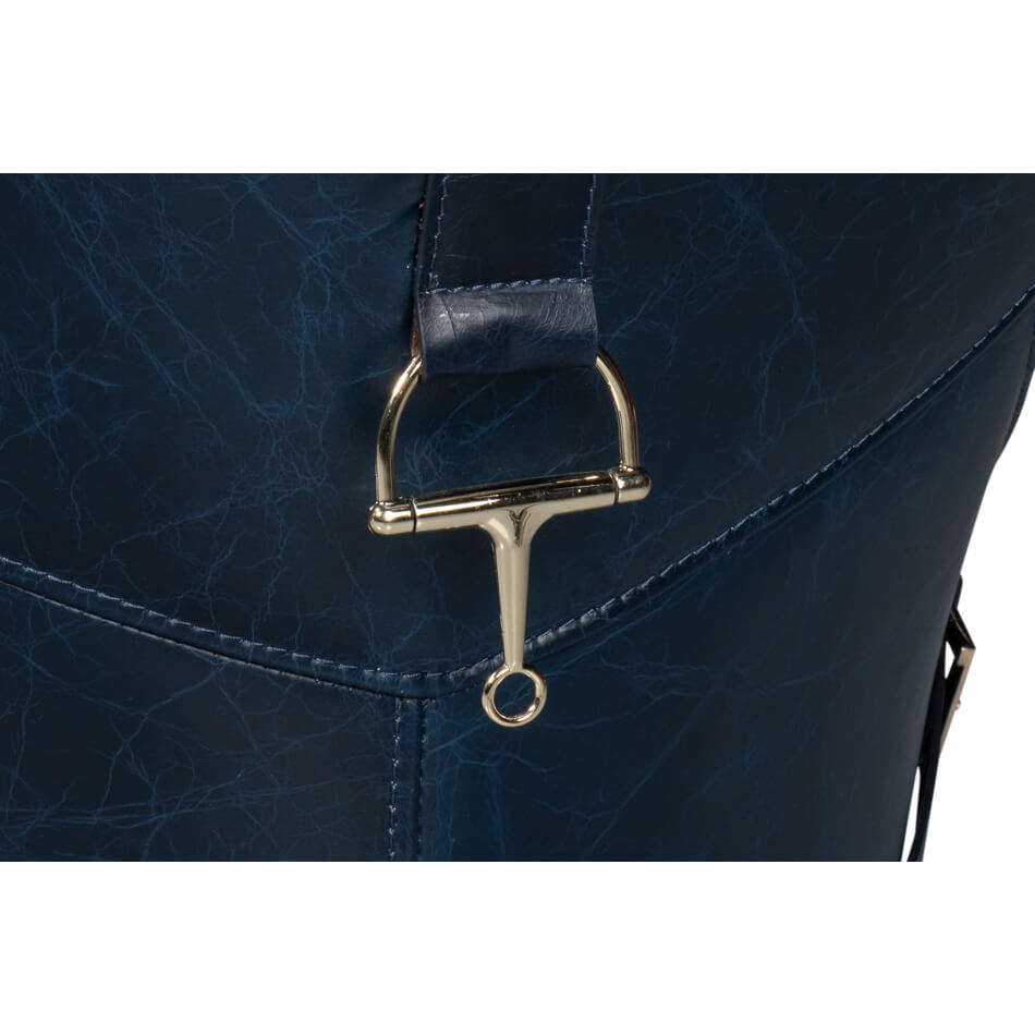 D-ring detail on blue leather armchair.