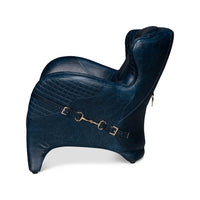 Blue armchair side view with buckle accent.
