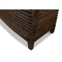 Base detail of ribbed bowfront cabinet, showing leg design.