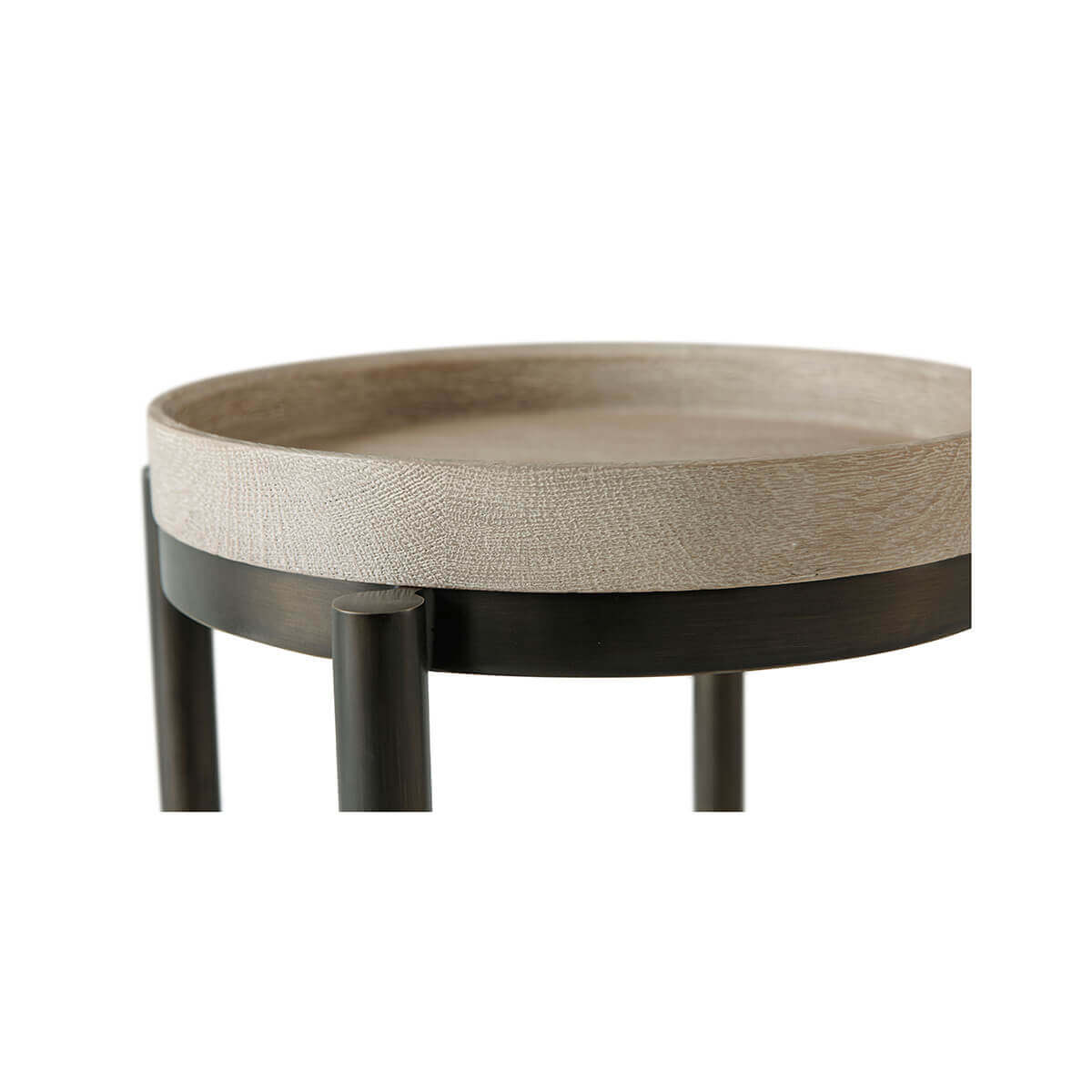 Close-up of top shelf on modern round accent table