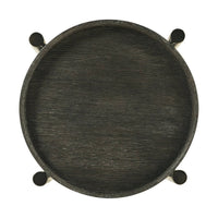 Top view of modern round accent table, dark wood