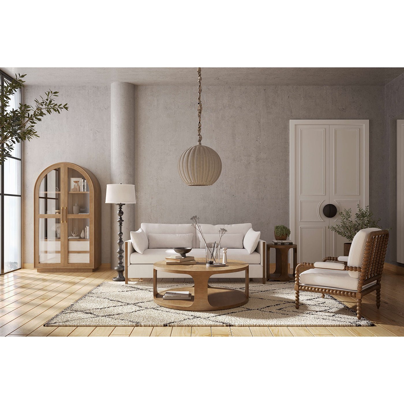 Stylish living room featuring round coffee table centerpiece.