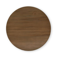 Top view of round wooden coffee table.