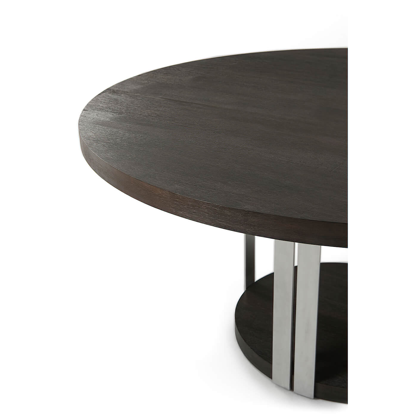 Close-up of round dining table top with metal frame.