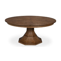 Closed round jupe dining table with pedestal base.