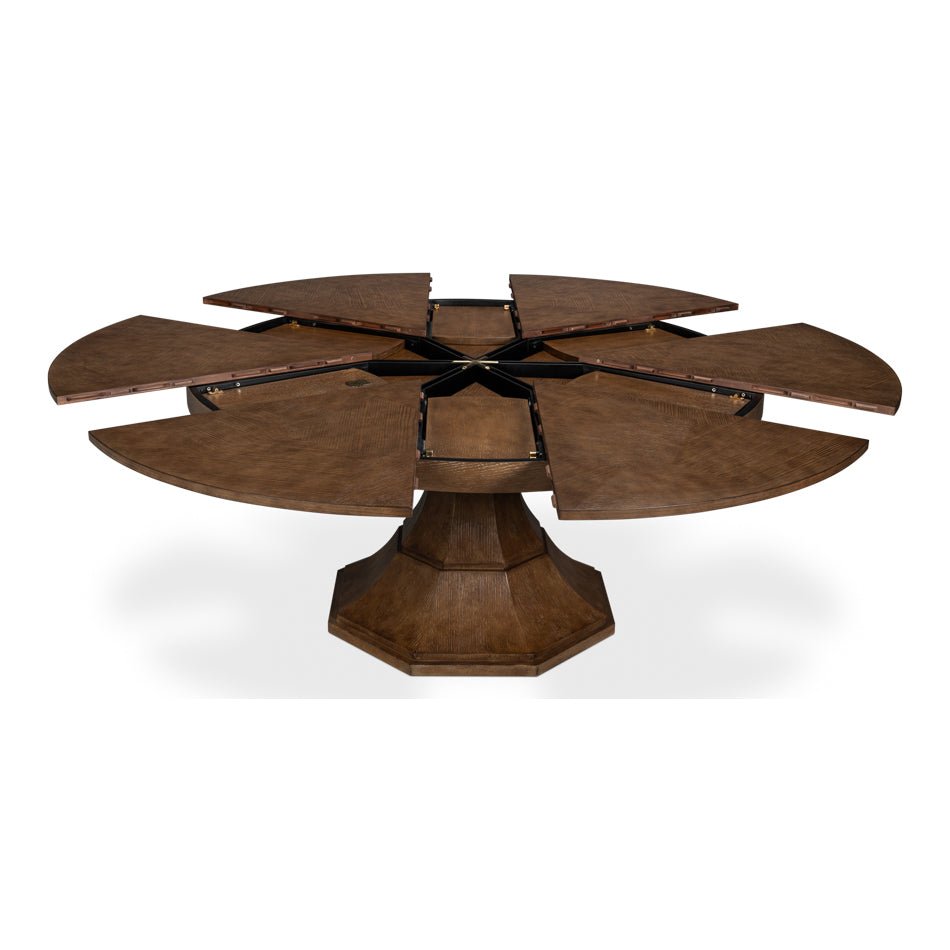 Fully open round jupe dining table with segments.