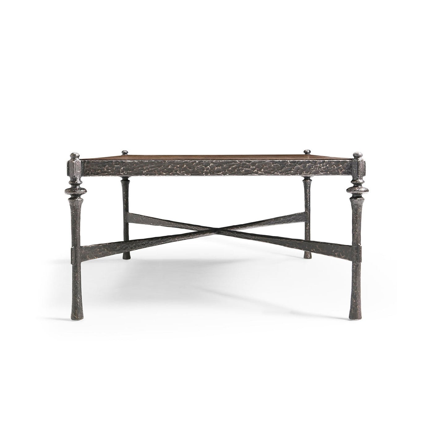 Side view of modern rustic hammered iron coffee table.