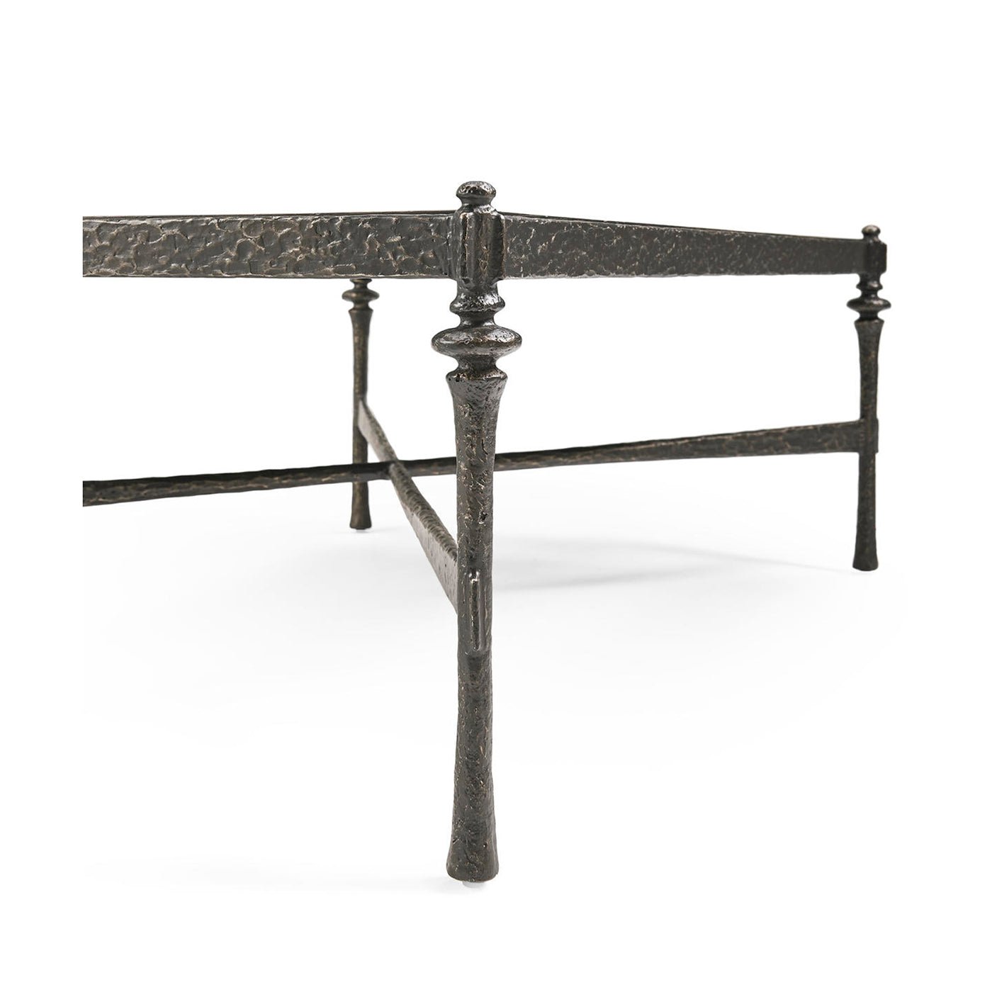 Perspective view showing crossbars on rustic iron coffee table.