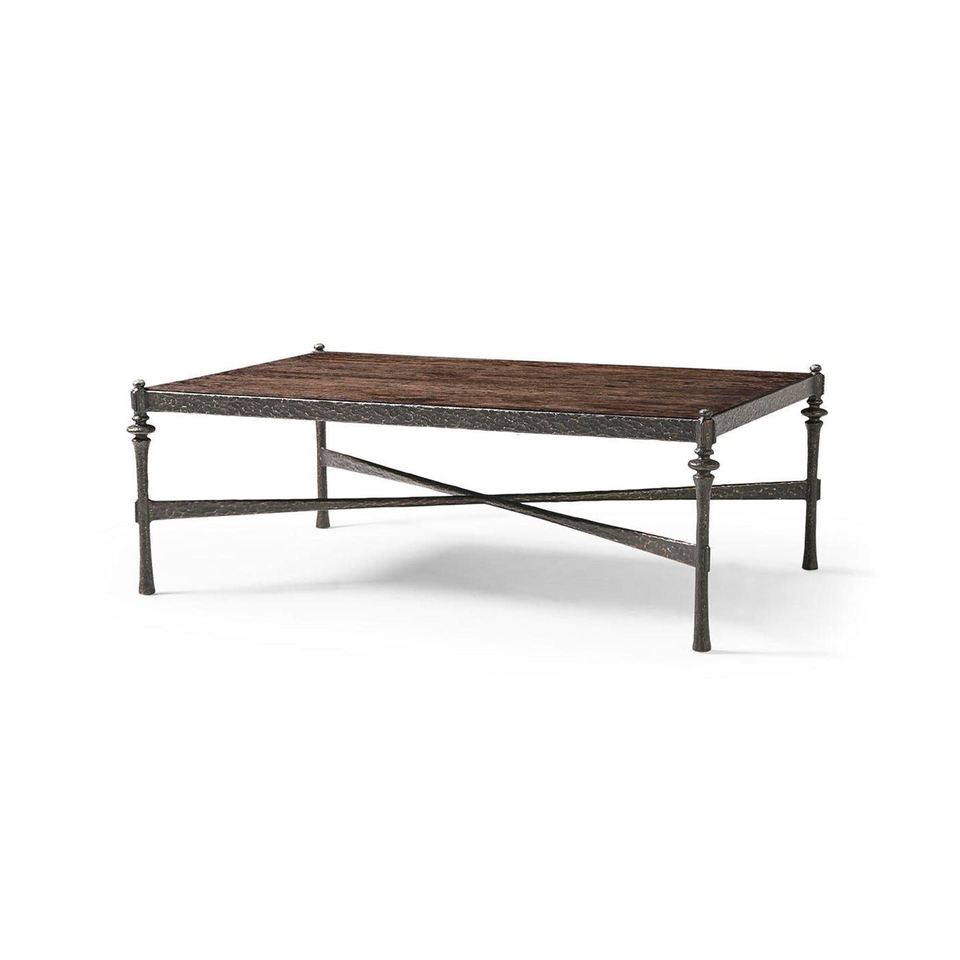 Angled view of modern rustic hammered iron coffee table.