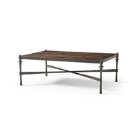 Angled view of modern rustic hammered iron coffee table.