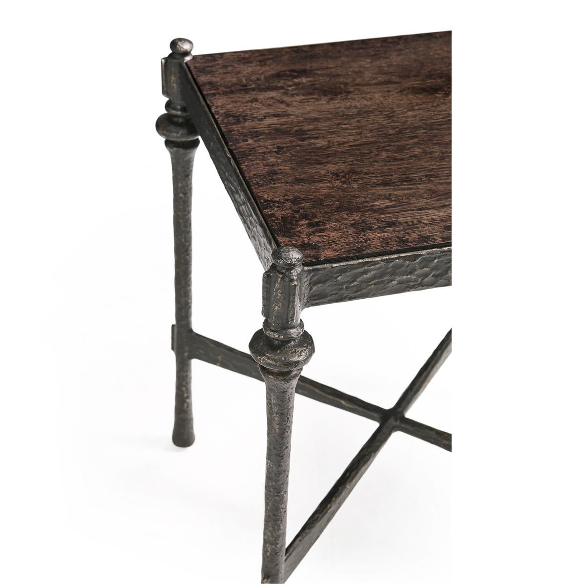 Corner detail of iron side table, textured finish.