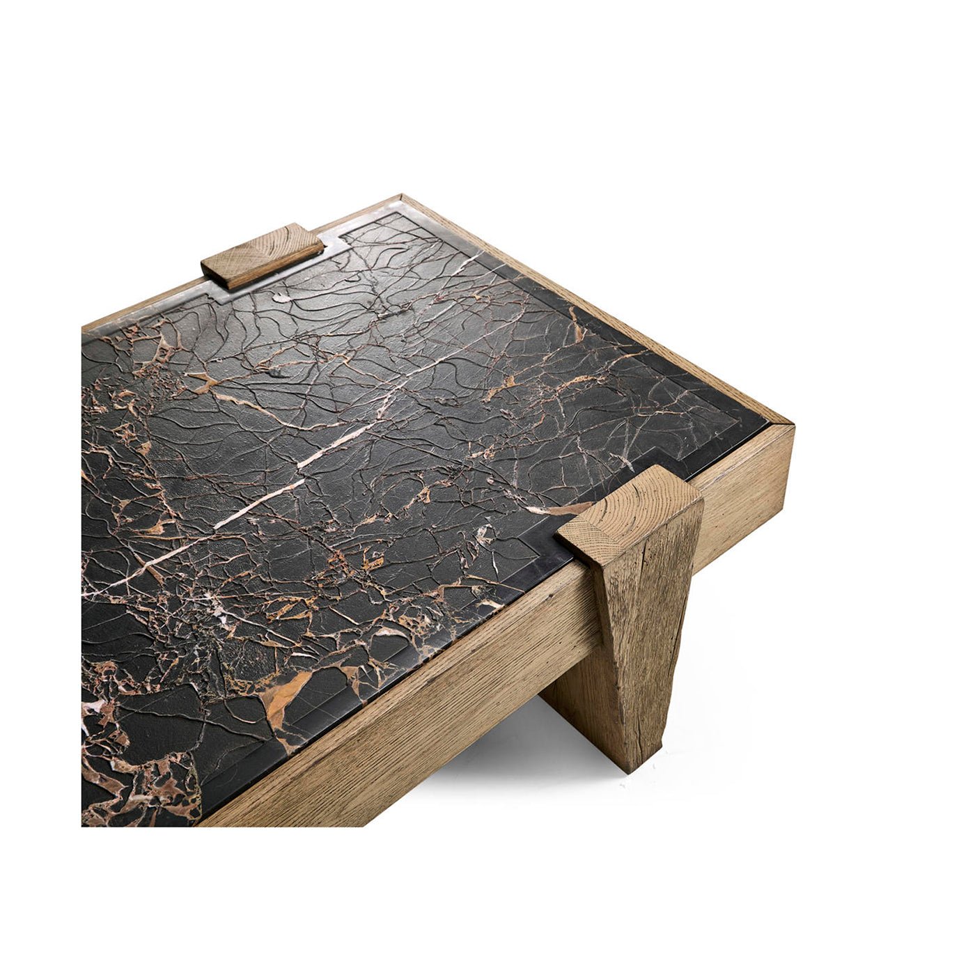 Corner detail of marble top and oak coffee table.