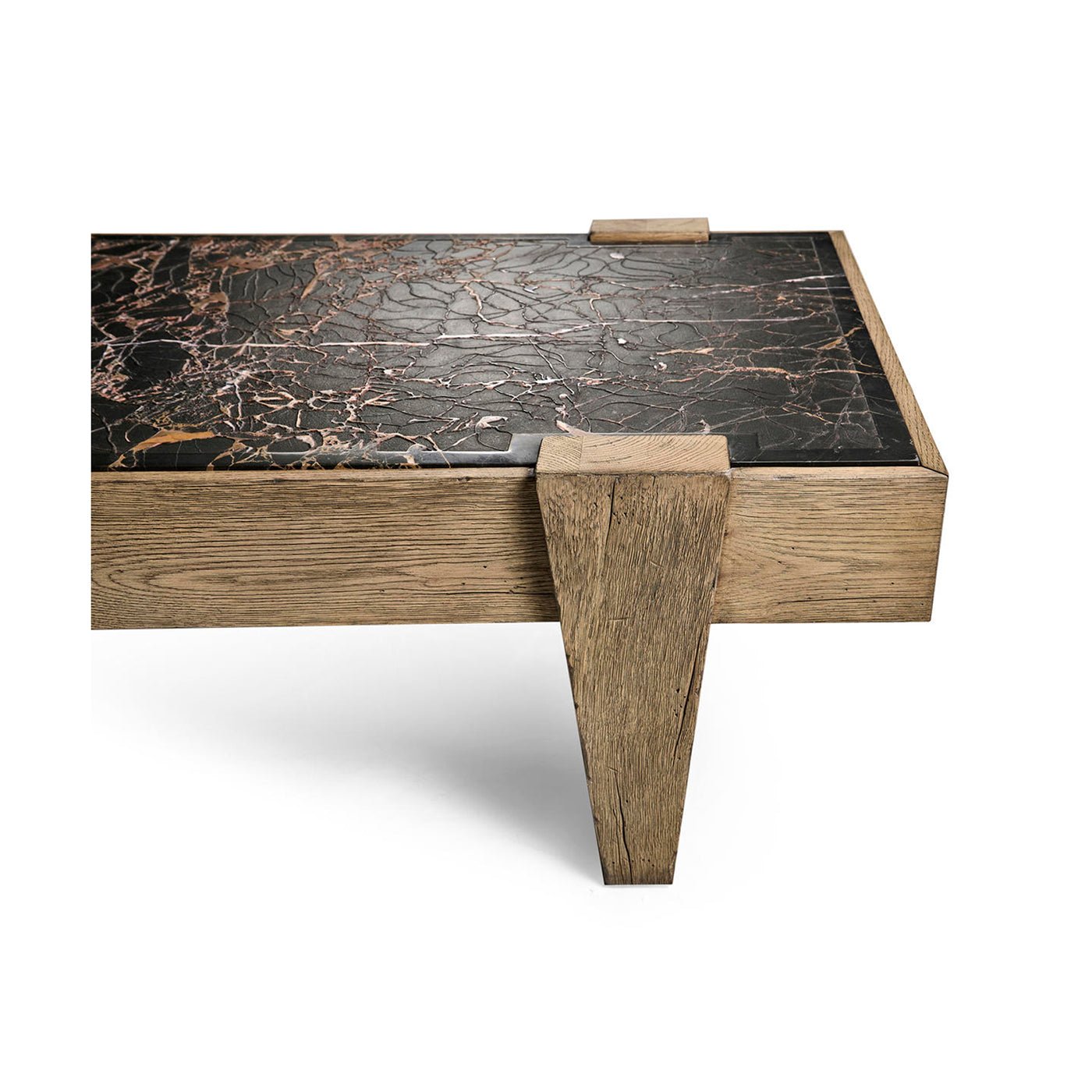Coffee table edge and leg close-up.